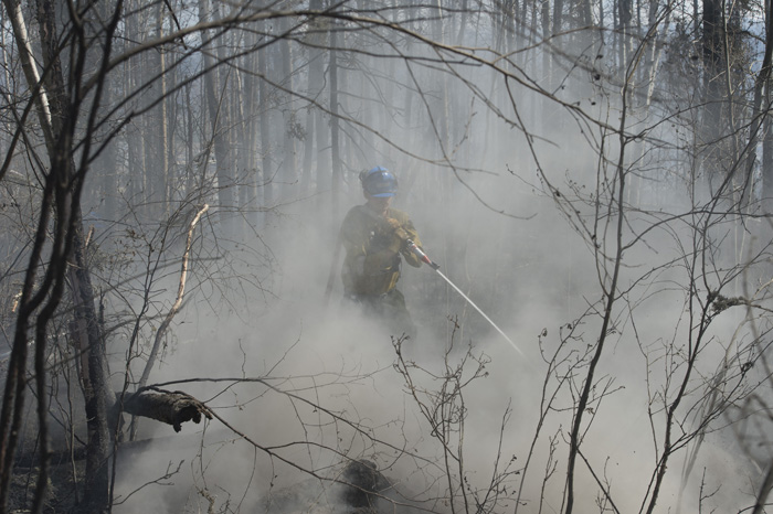 Fort Mac Firefighter in smoke